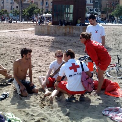 Injured Juho assited by Red Cross
